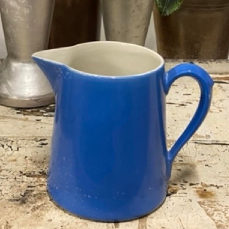 Old Blue Pitcher with White Interior