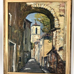 Framed Oil on Board - A street in orange showing the Cathedral at the end, Signed and Dated
