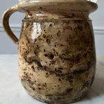 Shades of Brown and Cream Pottery Pitcher
